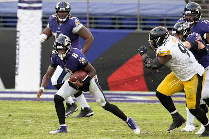 Nov 1, 2020; Baltimore, Maryland, USA; Baltimore Ravens quarterback Lamar Jackson (8) rushes during the second half against the Pittsburgh Steelers at M&T Bank Stadium.